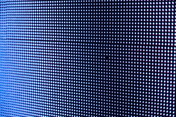 A close-up shot of a dead pixel on an LED screen.