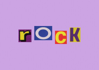 Rock word from cut out magazine colored letters