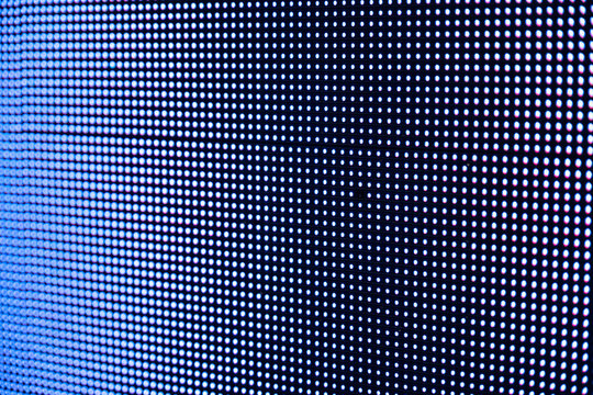 A close-up shot of a dead pixel on an LED screen.