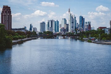 Fototapeta na wymiar Drone view of the cityscape of Frankfurt with skyscrapers and bridge over the river Main in Germany