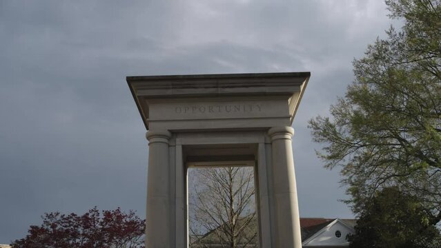 James Meridith statue, American civil rights leader, on the campus of Ole Miss in Oxford, Mississippi with video tilting down.
