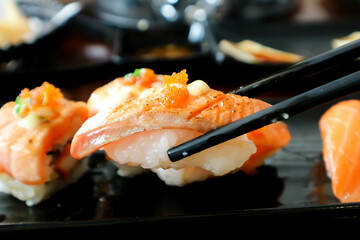 salmon sushi or rice topped with salmon