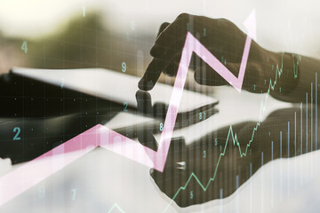 Multi exposure of abstract creative financial chart with upward arrow and finger presses on a...