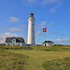 Fototapeta na wymiar Beautiful old light house at the west coast of Denmark. Hirtshals.