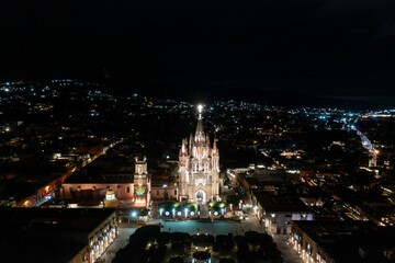 Aerial shot of the Catholic Church at night in San Miguel de Allende, Mexico.