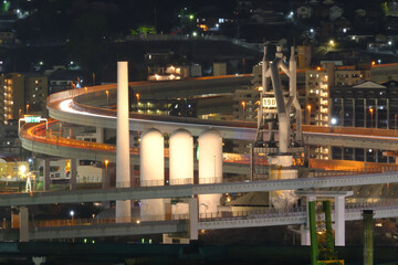 世界遺産の東田第一高炉跡と北九州都市高速道路の光跡夜景