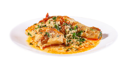Shkmeruli is a traditional Georgian dish of chicken in garlic sauce in the white plate, isolated on white