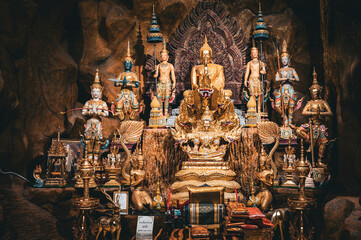 Nakhon Nayok, March 05, 2023.  Wat Maniwong, A sacred temple with extravagant & lavish 1,000 Naka sculptures. Inside the cave
