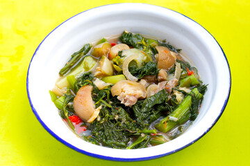Thai spicy soup with pork skin and vegetables