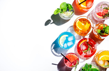 Summer cocktails drinks set. Assortment of multicolored strong and low alcoholic beverages for...