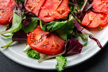 tomato salad ready to eat healthy meal food snack on the table copy space food background rustic top view keto or paleo diet veggie vegan or vegetarian food