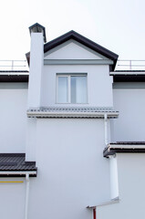 Part of a modern building against sky