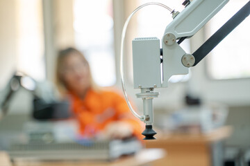 Engineer checking and operation robot arm at factory,Technology, automation,Innovation and engineering concept.