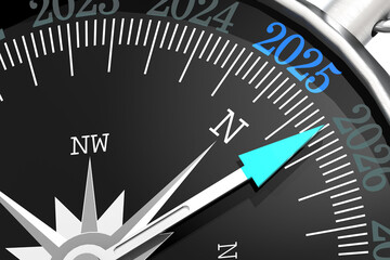 Metal compass with year 2025 on black surface