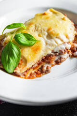 lasagna classic dish bechamel sauce, minced meat, grated cheese healthy meal food snack on the table copy space food background rustic top view
