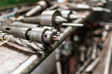 Old equipment, machines, tools in a rustic style in an abandoned mechanical factory