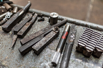 Old equipment, machines, tools in a rustic style in an abandoned mechanical factory