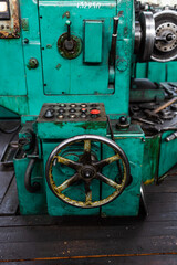 Old equipment, machines, tools in a rustic style in an abandoned mechanical factory