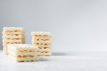 Fototapeta na wymiar Vanilla wafers on a marble plate, wafer cookies filled with vanilla cream