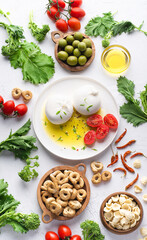 Puglian cuisine, the most famous ingredients of the south Italy: Burrata cheese, olive oil, homemade Orecchiette pasta, taralli, tomatoes and turnip tops or cima di rapa, pepperoncini. Puglia, Bari
