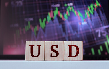 USD - acronym from wooden blocks with letters, United States Currency. Financial market concept