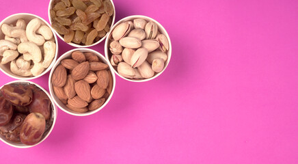 Mix of dried fruits and nuts for backgrounds and textures, Copy Space. Top view.