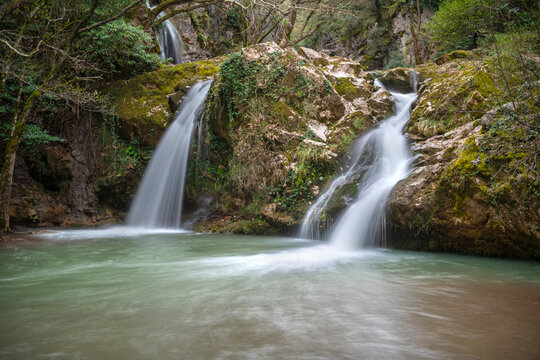 Waterfall. Long exposure waterfall photo. Stream. Long exposure.Long exposure photo of smooth waterfall flowing through steps.Hacilli waterfall. Türkiye. © osman