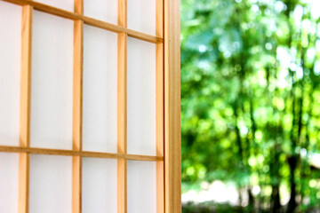 The Japanese style window open to the bamboo garden.