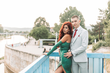 Fototapeta premium Young teenage couple dressed up for the prom