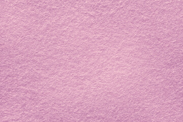 Felt fabric texture background in beige color with copy space for design. 
