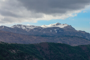 Fototapeta premium A landscape photo of ridges and bright blue sky in the background.