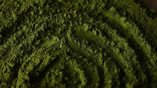 Matcha green tea powder rotating top view