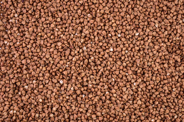 buckwheat groats texture background. Natural healthy food, vegan diet.
