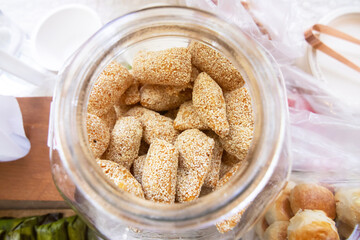 'Mo Lao' Taro sesame puffs are made from a soft and smooth mixture of taro root and rice flour, and...
