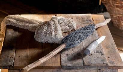 vintage fishing tools in a fishing hut