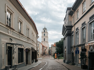 Vilnius old town. View of Sv.Jono street and St.Johns’ Church Bell Tower. Old town street in the centre of Vilnius
