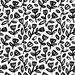 Meadow and wild flowers seamless pattern in naive childish style. Brush drawn linear flower branches with leaves. Abstract blossoms black and white decorative ornament. Childish or primitive drawing.