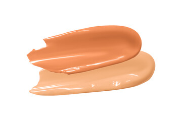 Two strokes of facial foundation in light beige and dark color. Isolated on a white background.