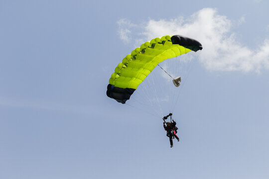 skydiver in the sky with a wing-type parachute