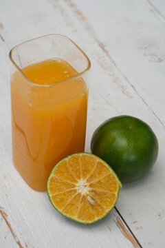 Orange juice. made from fresh squeezed oranges. tangerine. fresh fruit drink without preservatives, a source of natural vitamin C and antioxidants. served in clear glass. citrus nobilis. 