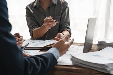 Business people meeting and working with financial report, talking about business plan for investment, finance analysis concept