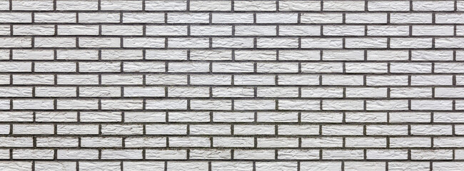 horizontal part of light yellow brick wall
