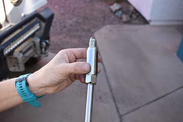 Changing Spark Plugs in Car in Driveway at Home