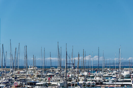 sailing boats moored in estepona port on a spring day