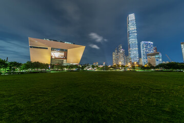 Night scenery of West Kowloon Cultural District of Hong Kong city - obrazy, fototapety, plakaty