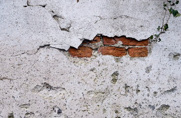 Old Brick Wall Texture Background with Peeling White Paint. Exterior  English Heritage Building Grunge Red Stonewall Facade With Damaged Plaster. Abstract Crack Wall Surface backdrop