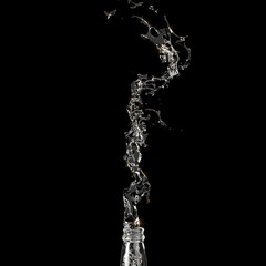 Close up Water splash from bottle glass isolate on black. 3D Rendering.