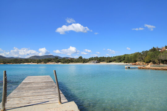 View at the beach Capo Ceraso with a jetty, Sardinia