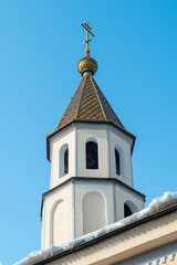 Obraz premium SHYMKENT, KAZAKHSTAN - JANUARY 24, 2023: Orthodox crosses on the temple in honor of the icon of the Kazan Mother of God, Kazakhstan