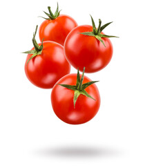 Small red cherry tomatoes floating on white background.